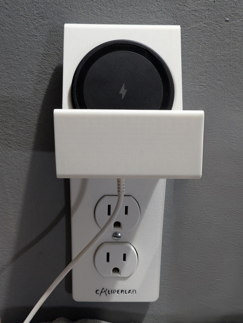 Modern Outlet Cover with Built-In Wireless Phone Charger