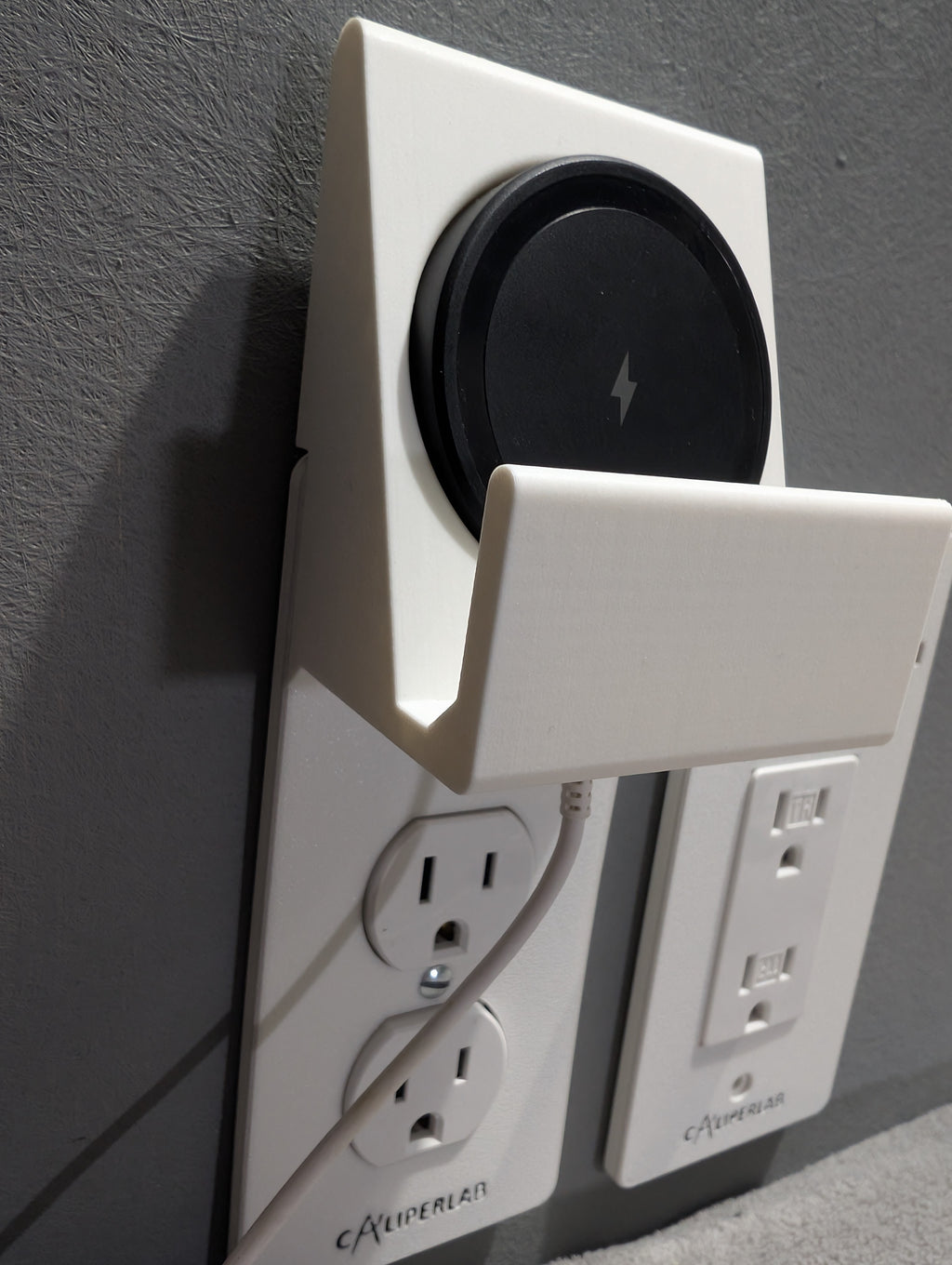 Modern Outlet Cover with Built-In Wireless Phone Charger